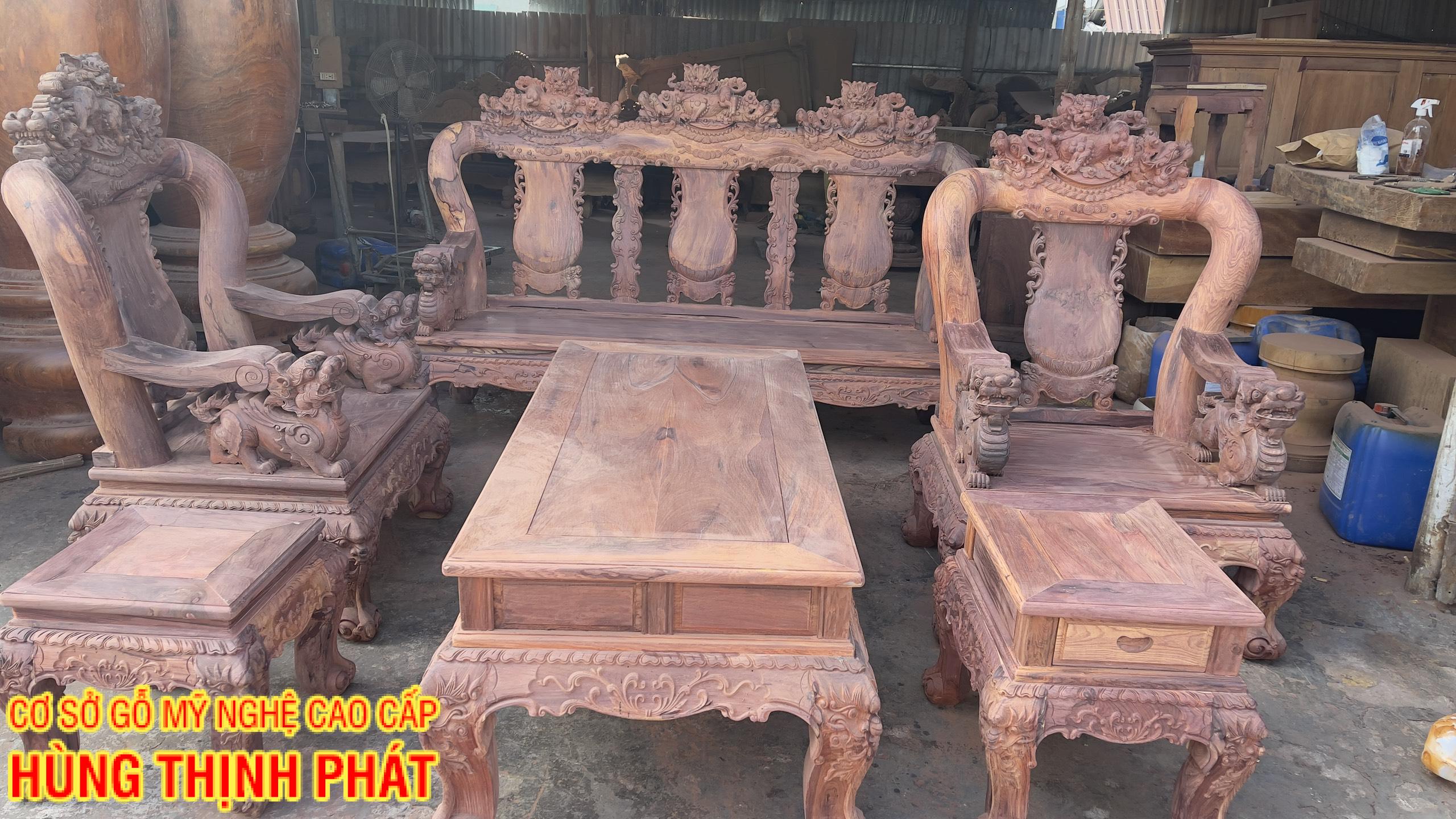 bàn ghế phòng khách hàng mộc gỗ Cẩm Lai tay 12 đục Nghê 6